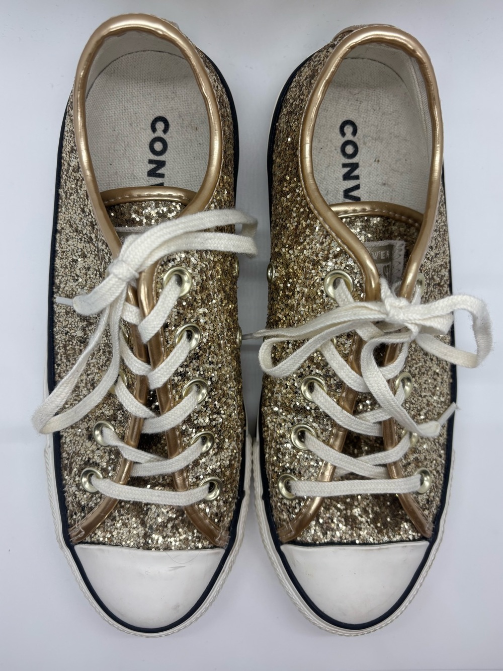 Converse Women’s Gold Glitter Low Top Sneakers